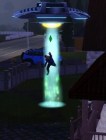 a man flails, suspended in a vertical beam of light in a nighttime, suburban scene